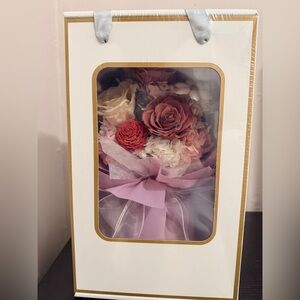 Elegant Floral Arrangement with Pink and Red Accents